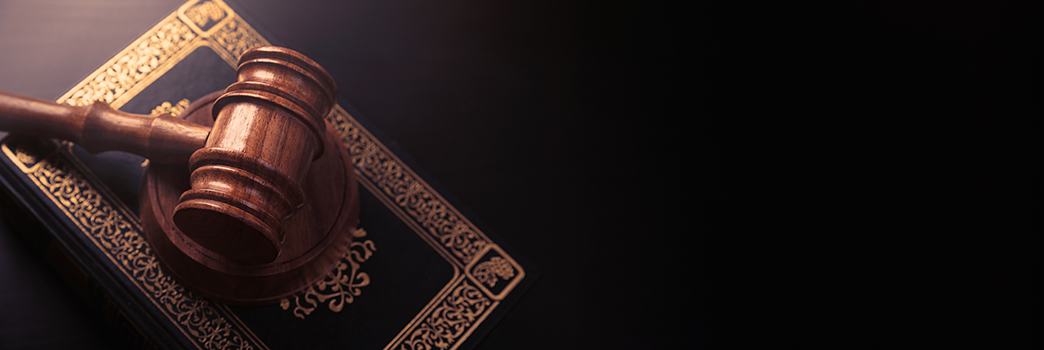 Brown background with gavel used for announcements